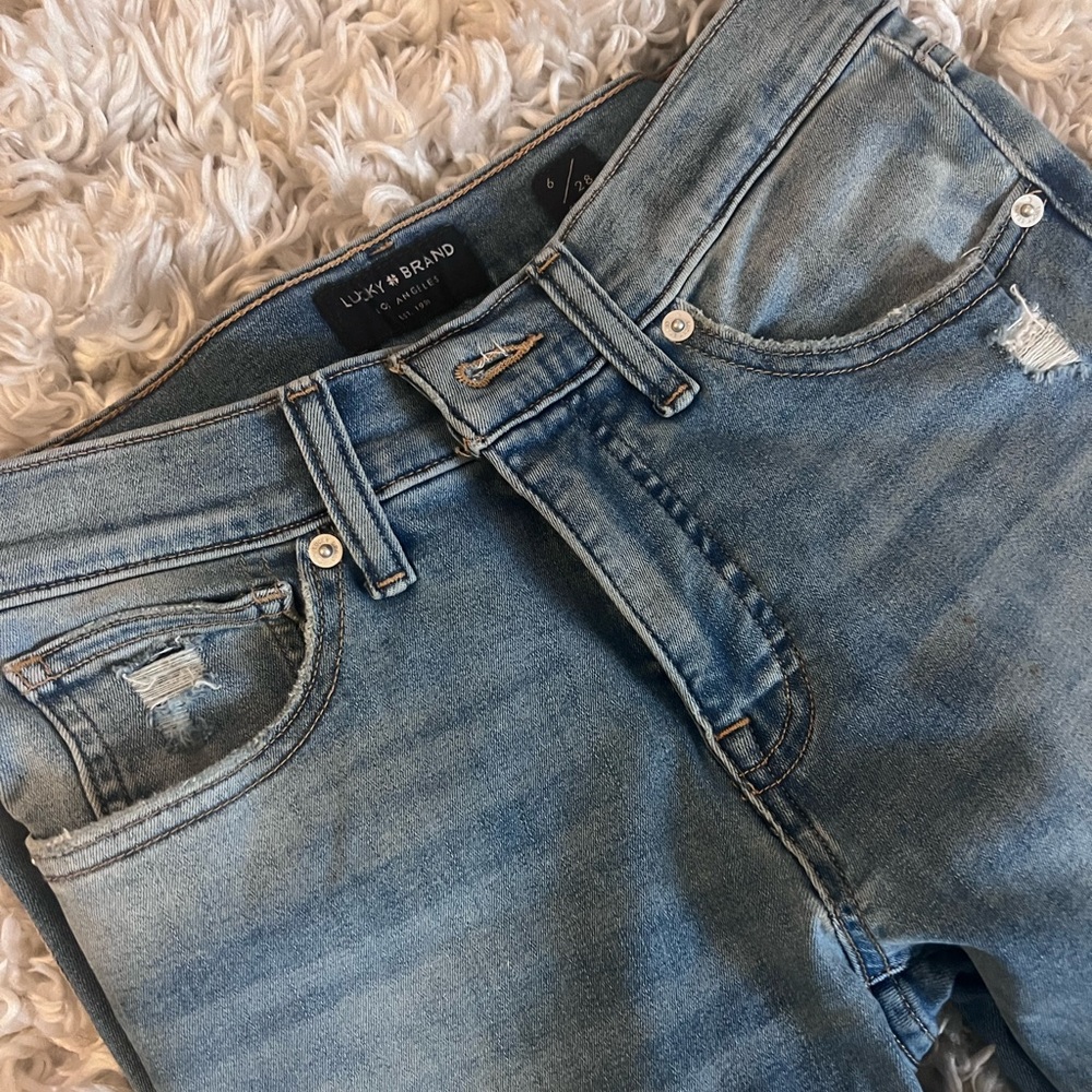 Lucky Brand straight leg jeans with distressed hem